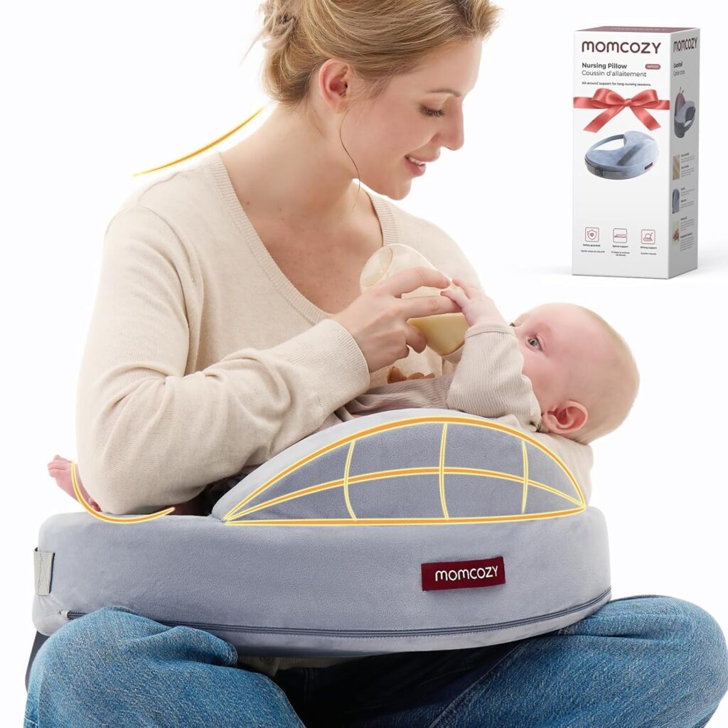 Mom using the Momcozy Exclusive Memory Foam Nursing Pillow to comfortably breastfeed her baby, showing ergonomic support and soft fabric design.