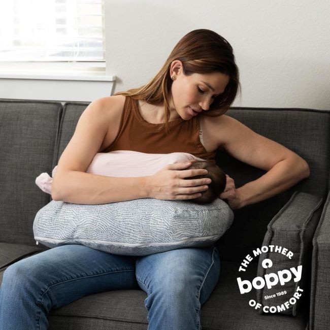 Boppy Nursing Pillow blue speckled current with firm ergonomic support, water-repellent cushion and washable cover