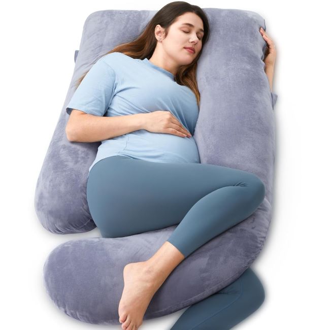 Momcozy U-shaped pregnancy pillow providing full body support for back, legs, and hips during sleep